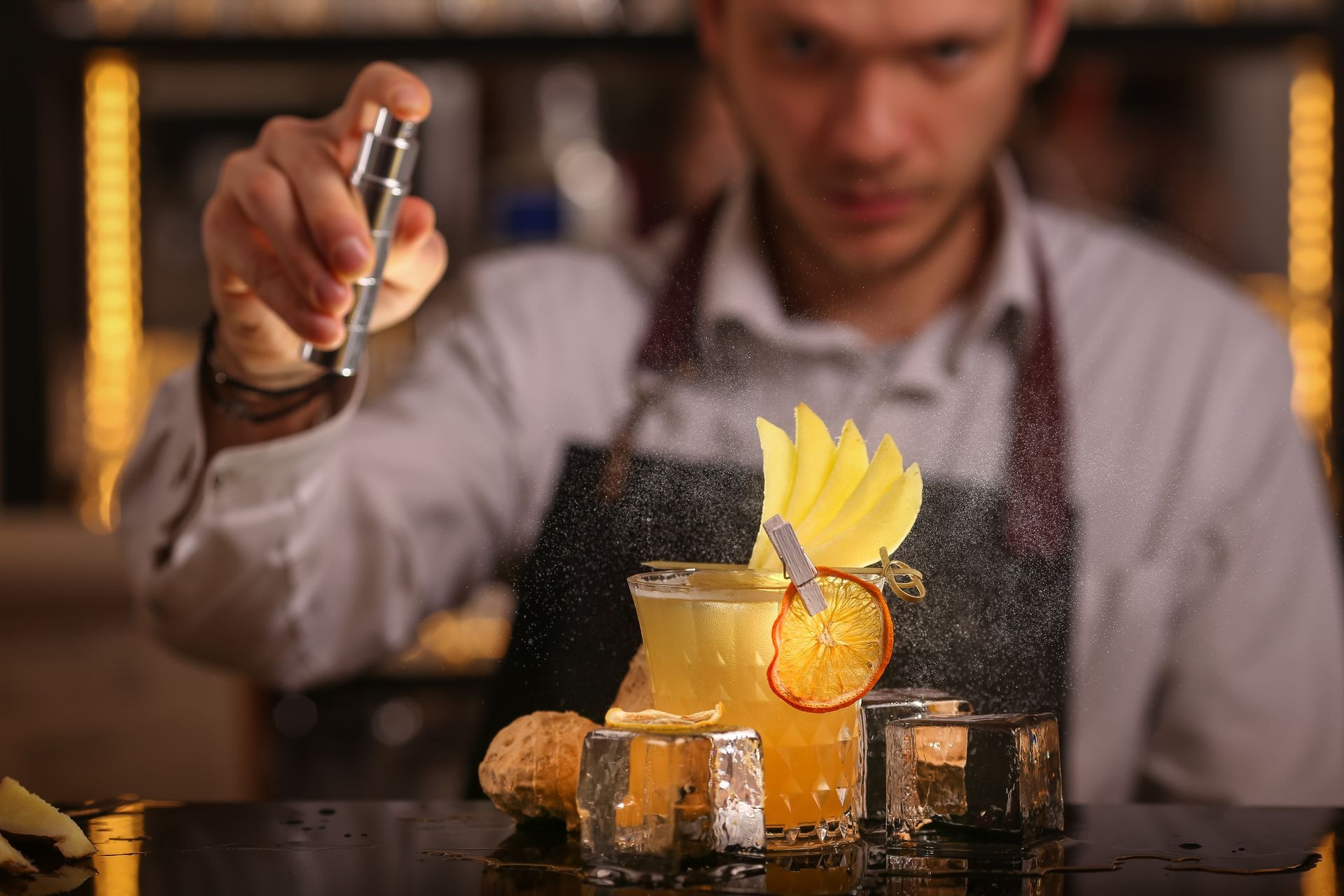 Fresh alcohol Penicillin cocktail with orange slice and ice cubes